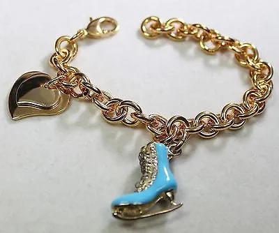 FIGURE SKATE BLUE  GOLD TONE  BRACELET DOUBLE HEART CHARM