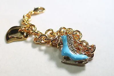 FIGURE SKATE BLUE  GOLD TONE  BRACELET DOUBLE HEART CHARM