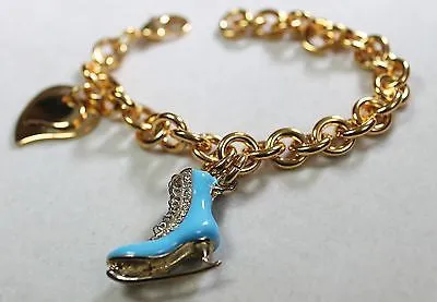 FIGURE SKATE BLUE  GOLD TONE  BRACELET DOUBLE HEART CHARM