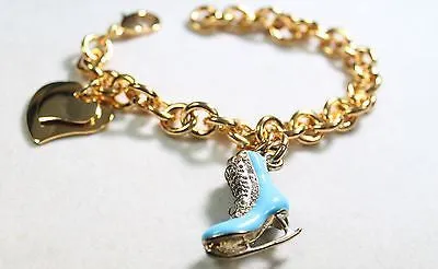 FIGURE SKATE BLUE  GOLD TONE  BRACELET DOUBLE HEART CHARM