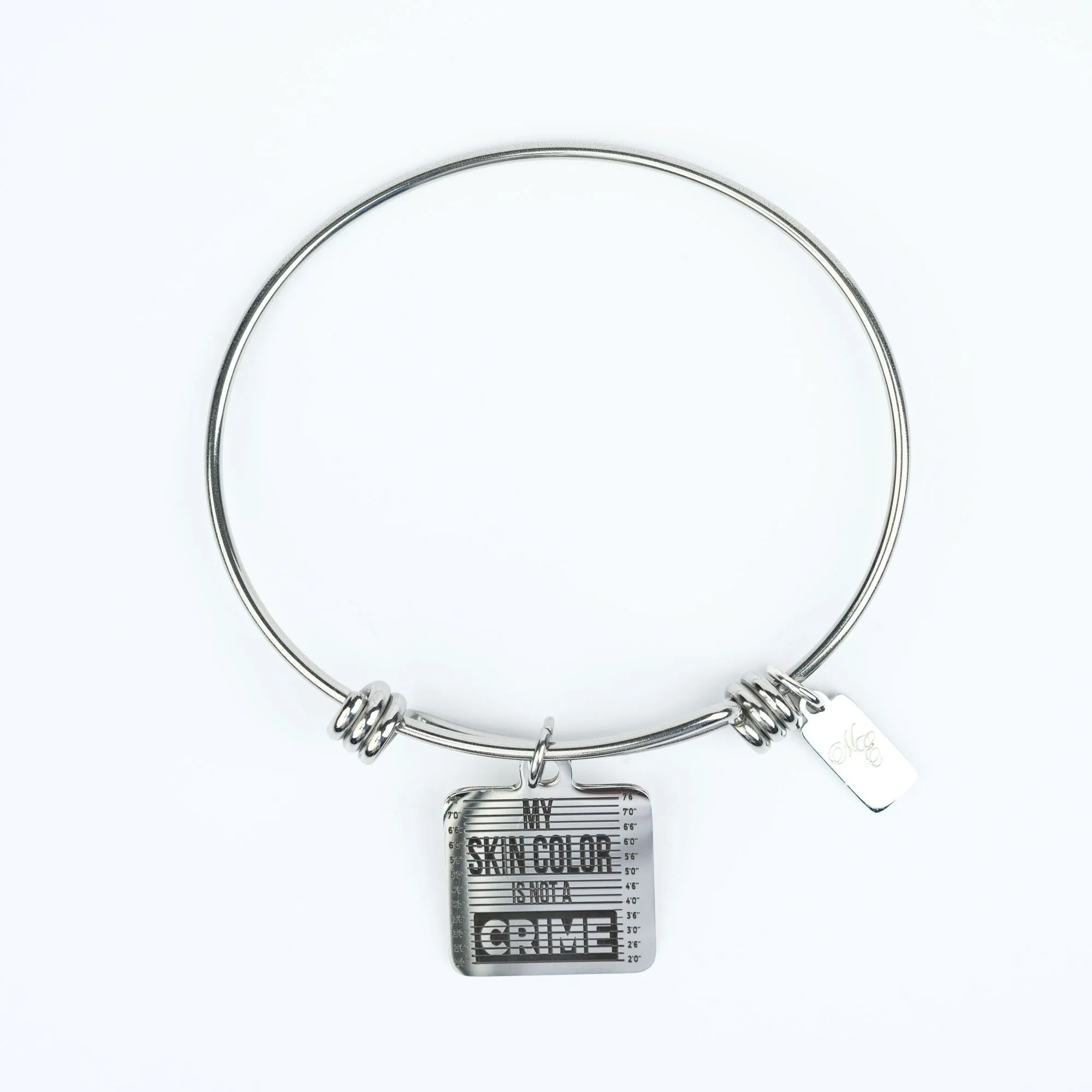 ME™ Word. My Skin Color Is Not a Crime Bangle - Silver