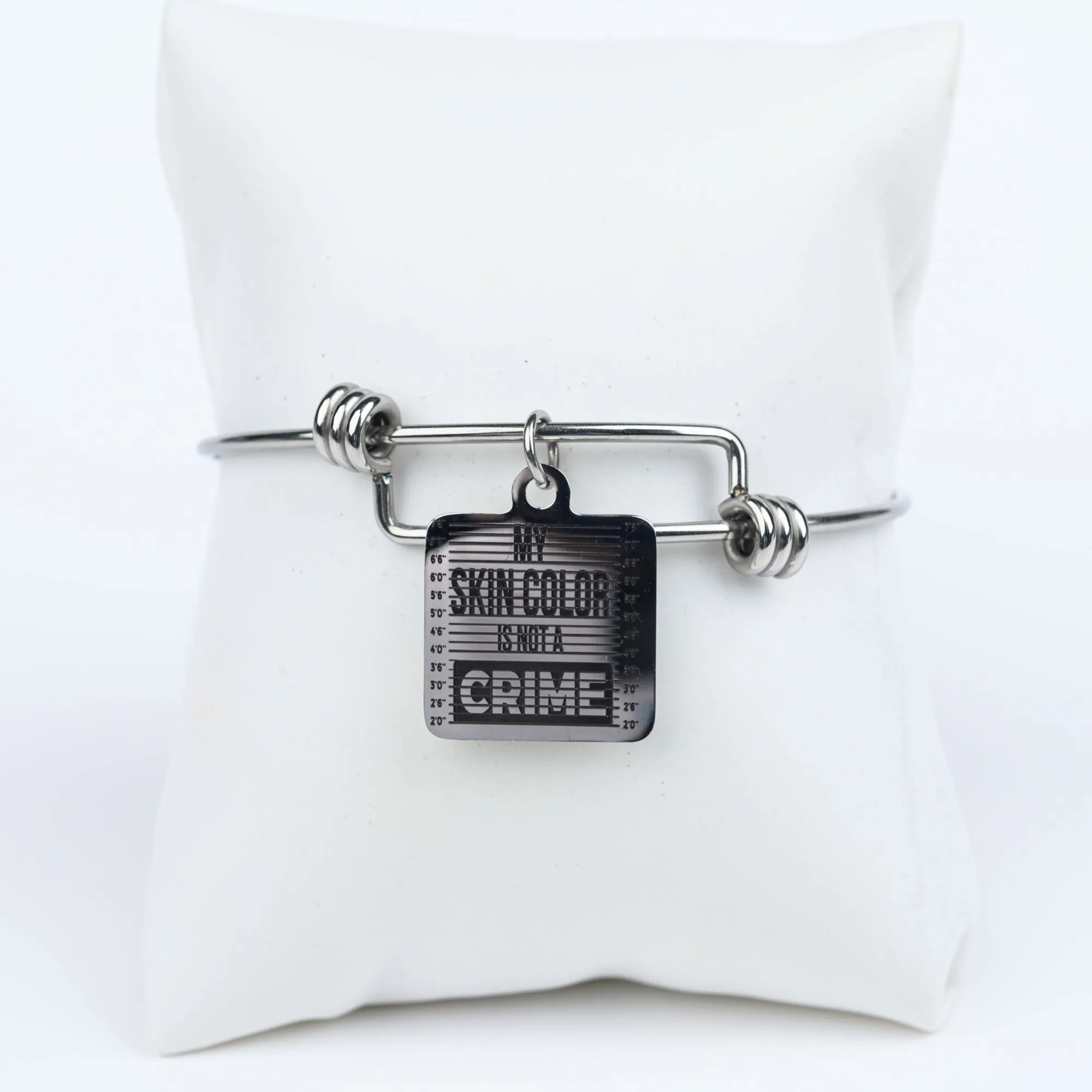 ME™ Word. My Skin Color Is Not a Crime Bangle - Silver