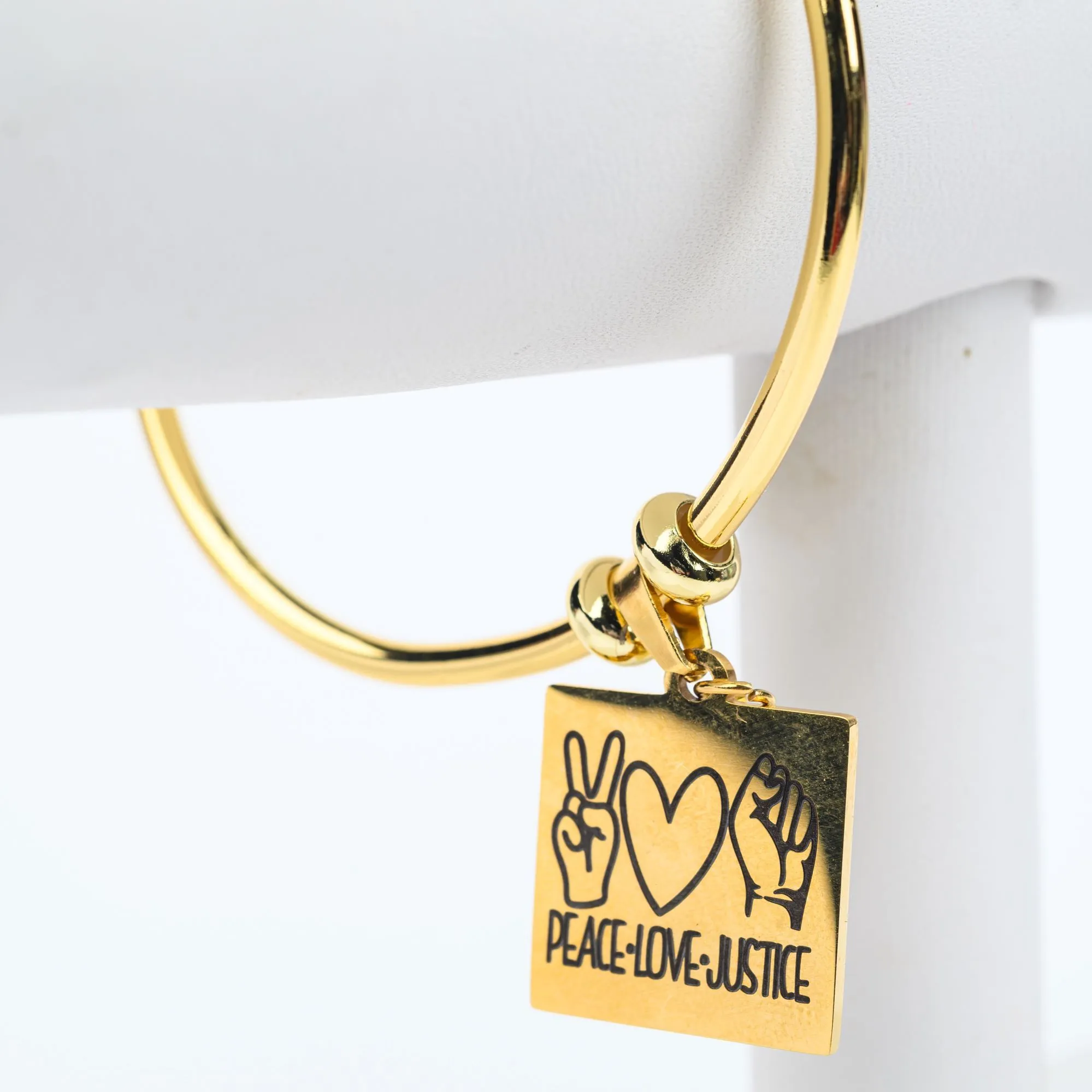 ME™ Word. Peace Love Justice Goldtone Bangle