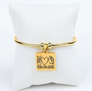 ME™ Word. Peace Love Justice Goldtone Bangle
